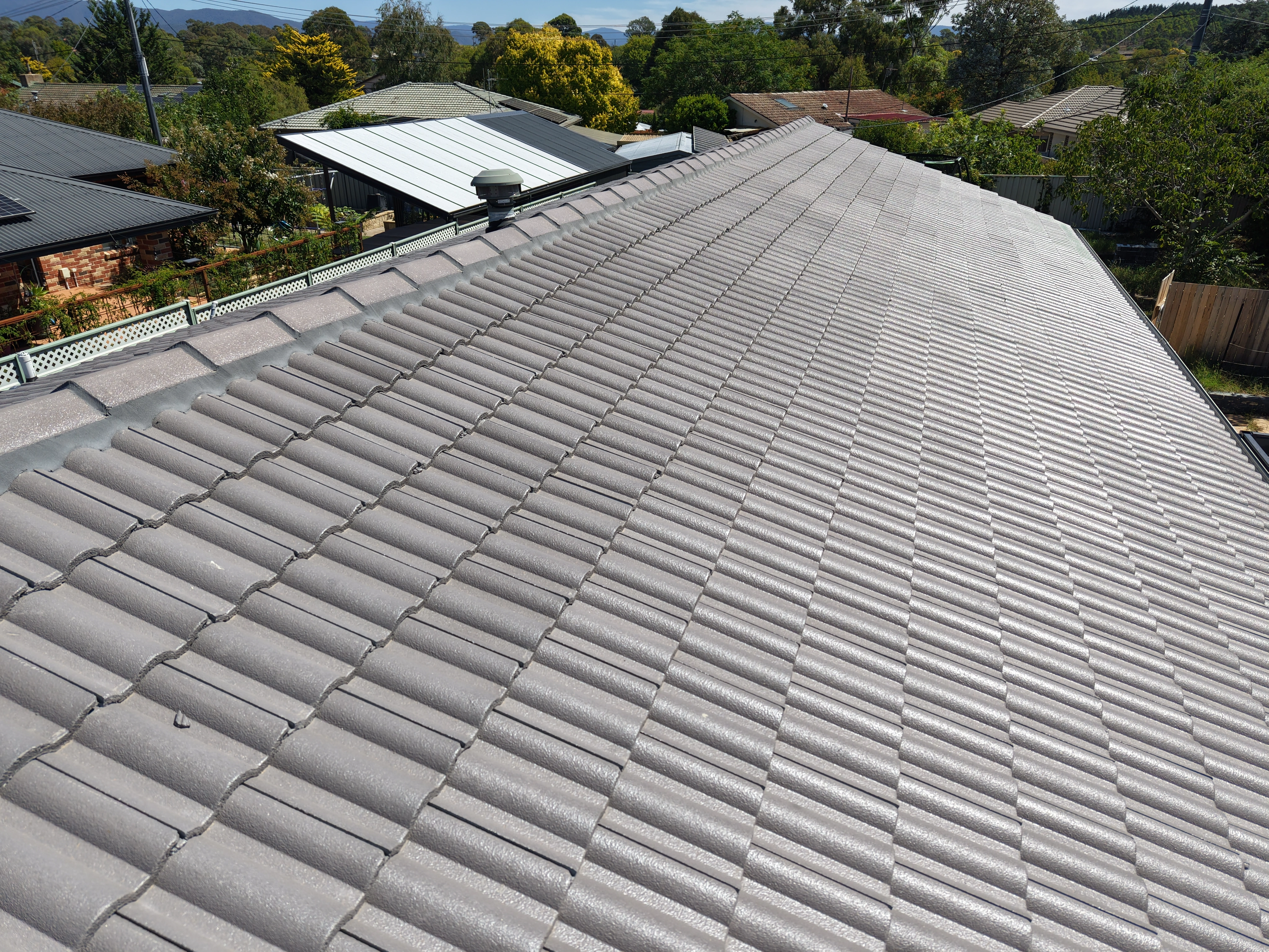 Tile Roofing project in Canberra, ACT by ShelterSafe - Three different roofs, one property—tile, twinwall porch, and Colorbond garage roof all done in a si... Tile roof rebedding project Canberra, ACT - quality workmanship