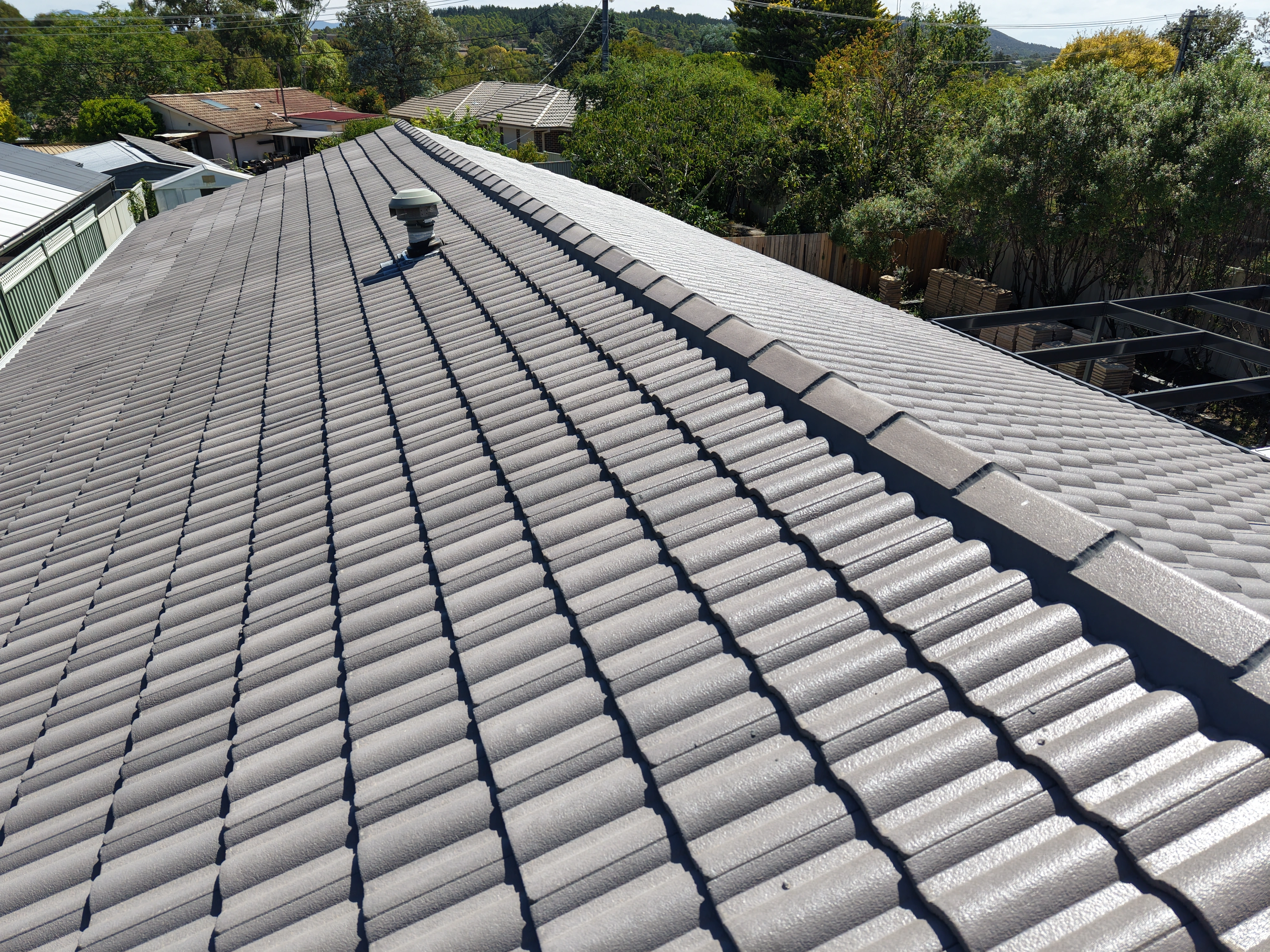 Tile Roofing project in Canberra, ACT by ShelterSafe - Three different roofs, one property—tile, twinwall porch, and Colorbond garage roof all done in a si... Terracotta tile roof Canberra, ACT - completed installation