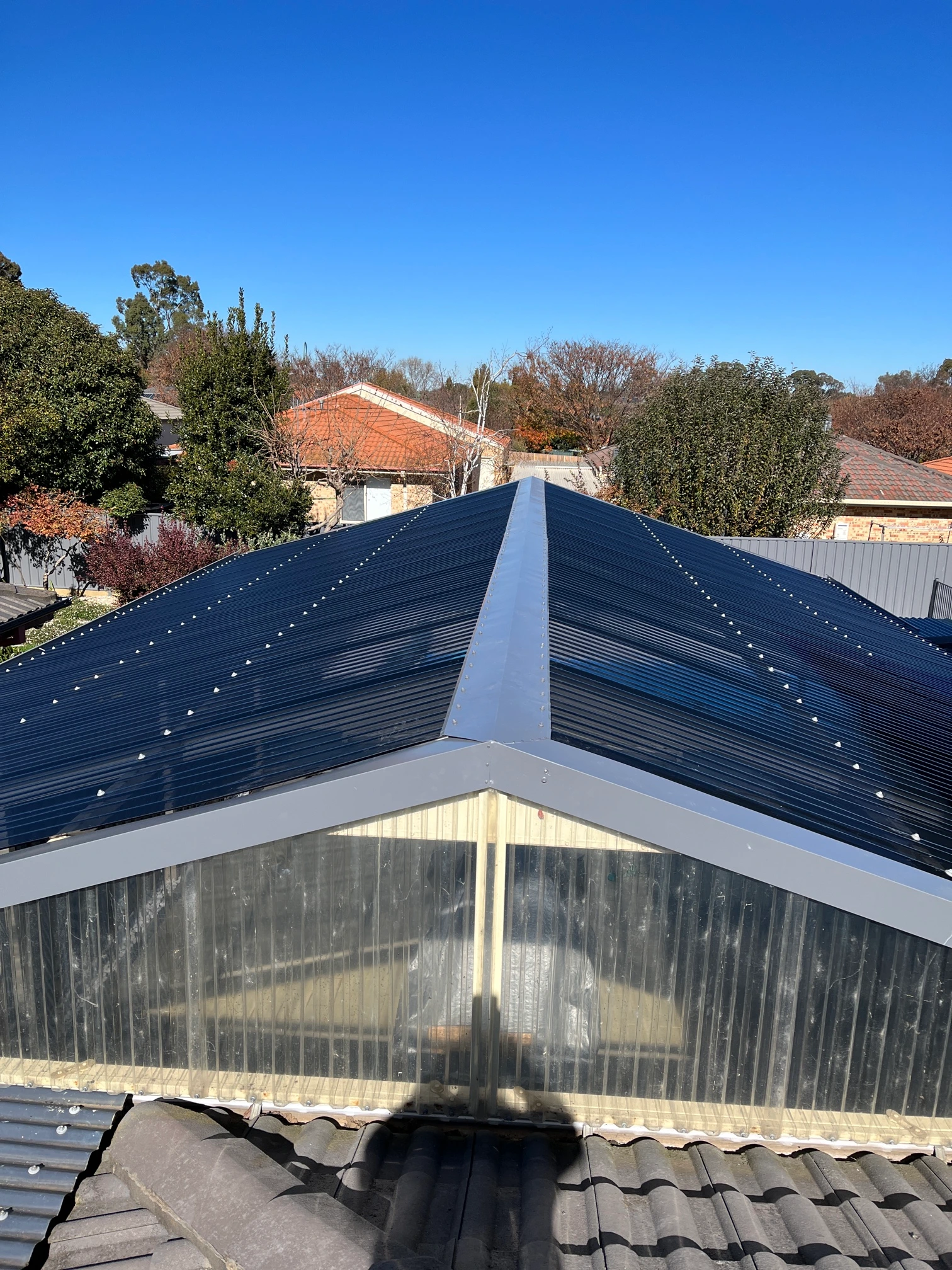 Polycarbonate Roofing project in Boorowa, NSW by ShelterSafe - Out in Boorowa, this patio took storm damage and needed new polycarbonate sheets. We replaced everyt... Polycarbonate patio roof Boorowa, NSW - transparent roofing installation