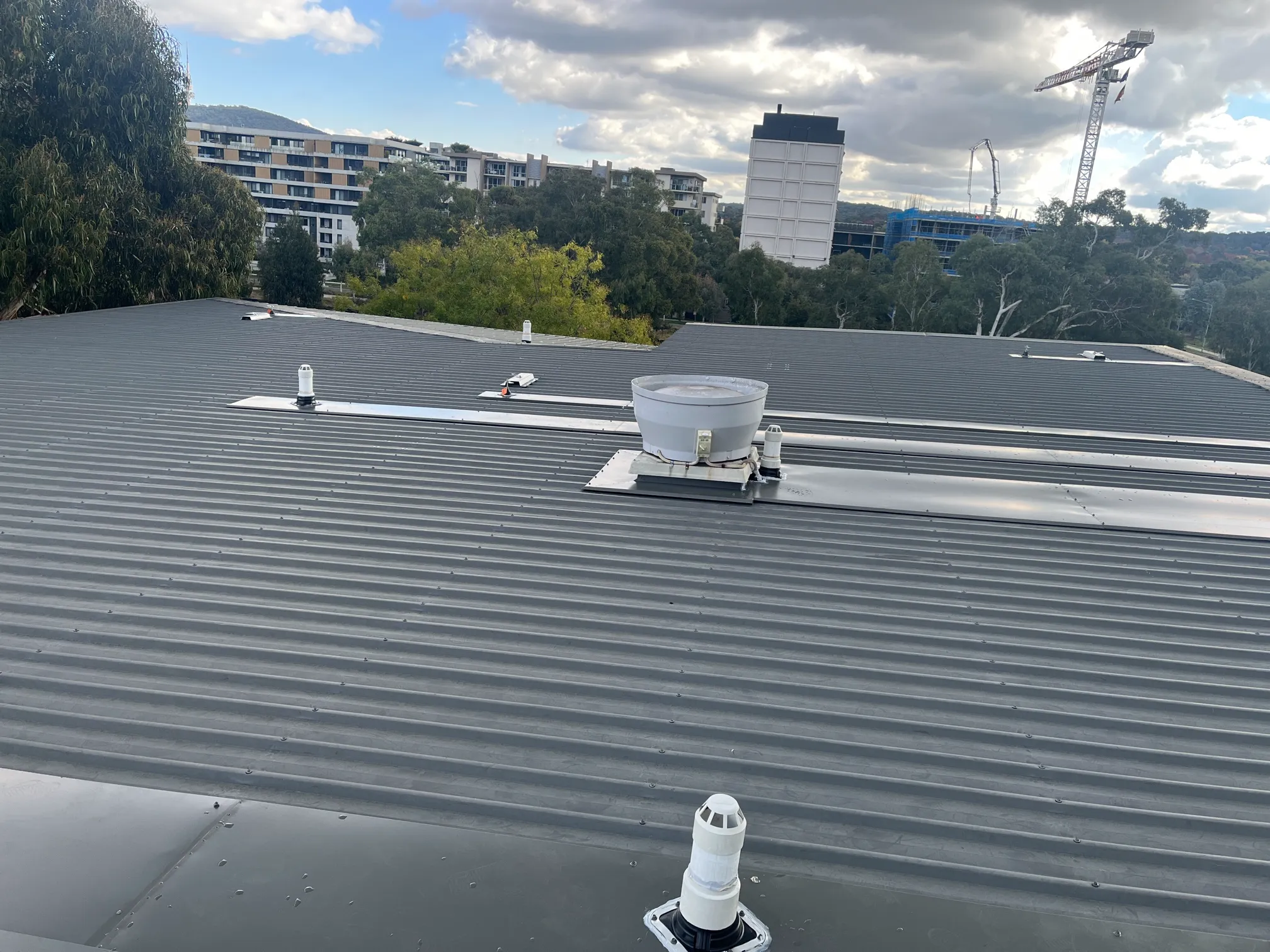 Repairs project in Woden, ACT by ShelterSafe - A Woden strata building needed roof flashings upgraded to current standards. We installed Colorbond ... Roof leak repair Woden, ACT - professional fix