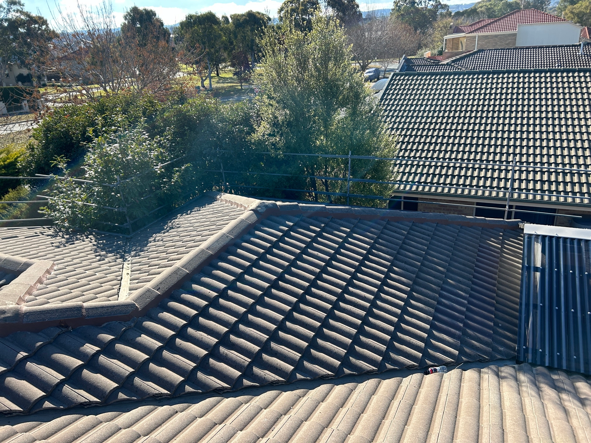 Tile Roofing project in Narrabundah, ACT by ShelterSafe - The ridge capping on this Narrabundah home was falling apart. We scraped out all the old bedding and... Concrete tile roof Narrabundah, ACT - professional maintenance