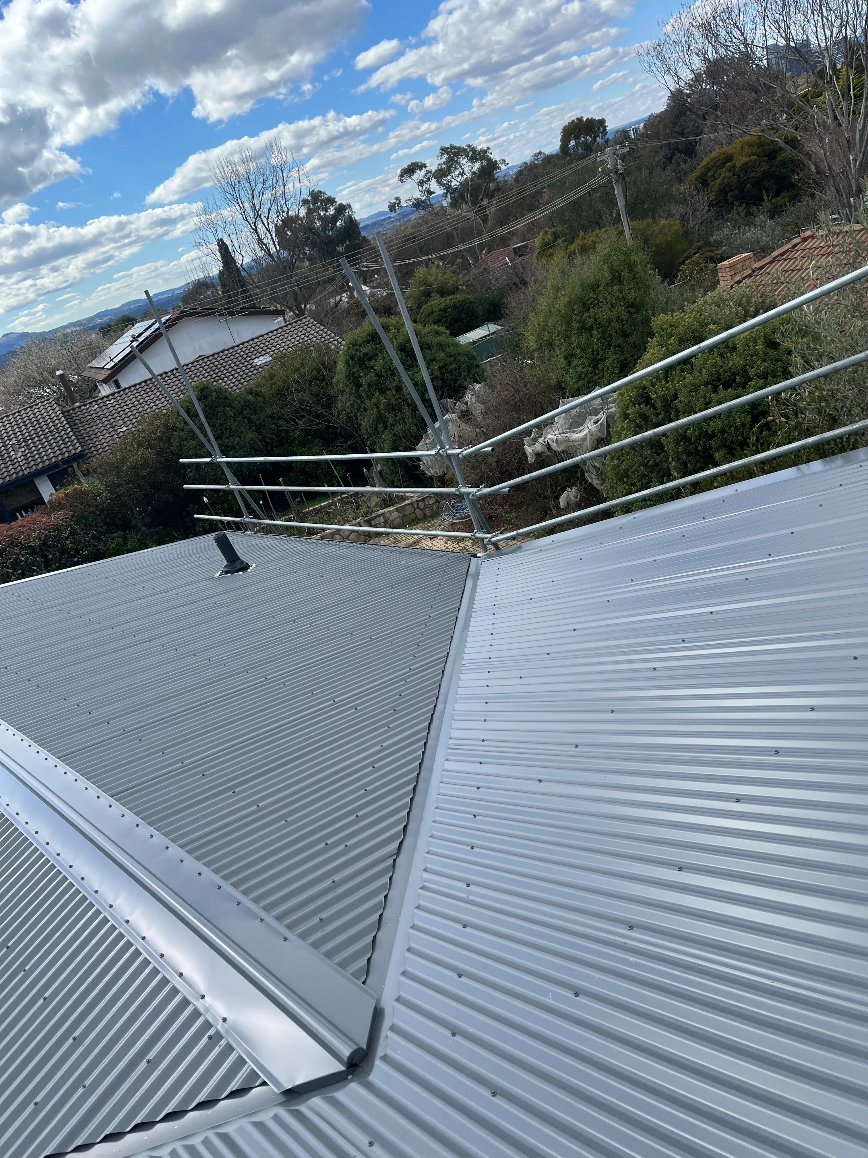 Metal Roofing project in Chifley, ACT by ShelterSafe - Hail left dents all over this Chifley roof. We gave it a complete makeover—new Colorbond Corrugated ... Professional metal roofing Chifley, ACT - weather-tight installation