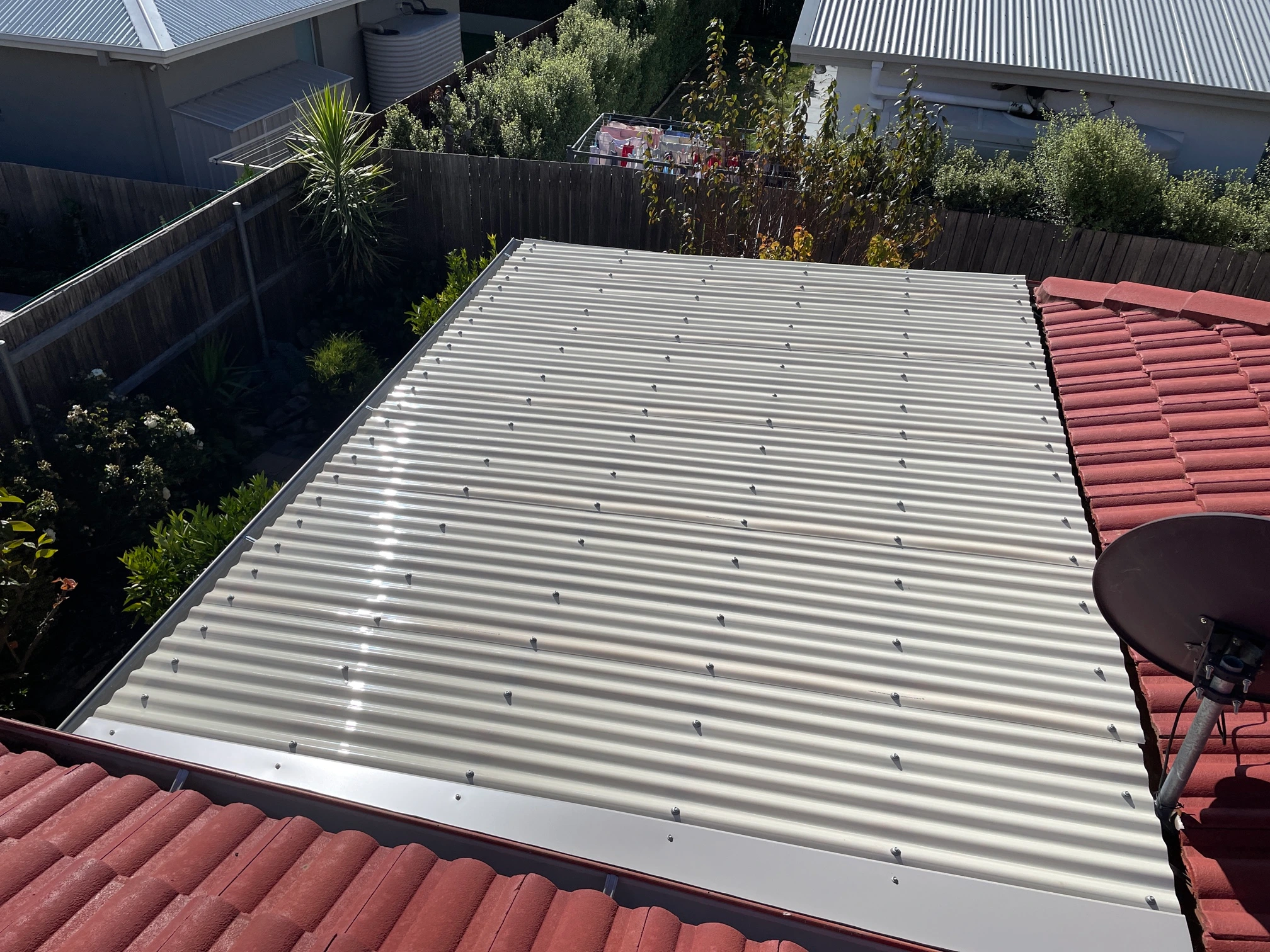 Polycarbonate Roofing project in Kingston, ACT by ShelterSafe - This Kingston patio got hammered in the 2020 hailstorm. We replaced the polycarbonate roofing fast s... Polycarbonate patio roof Kingston, ACT - transparent roofing installation