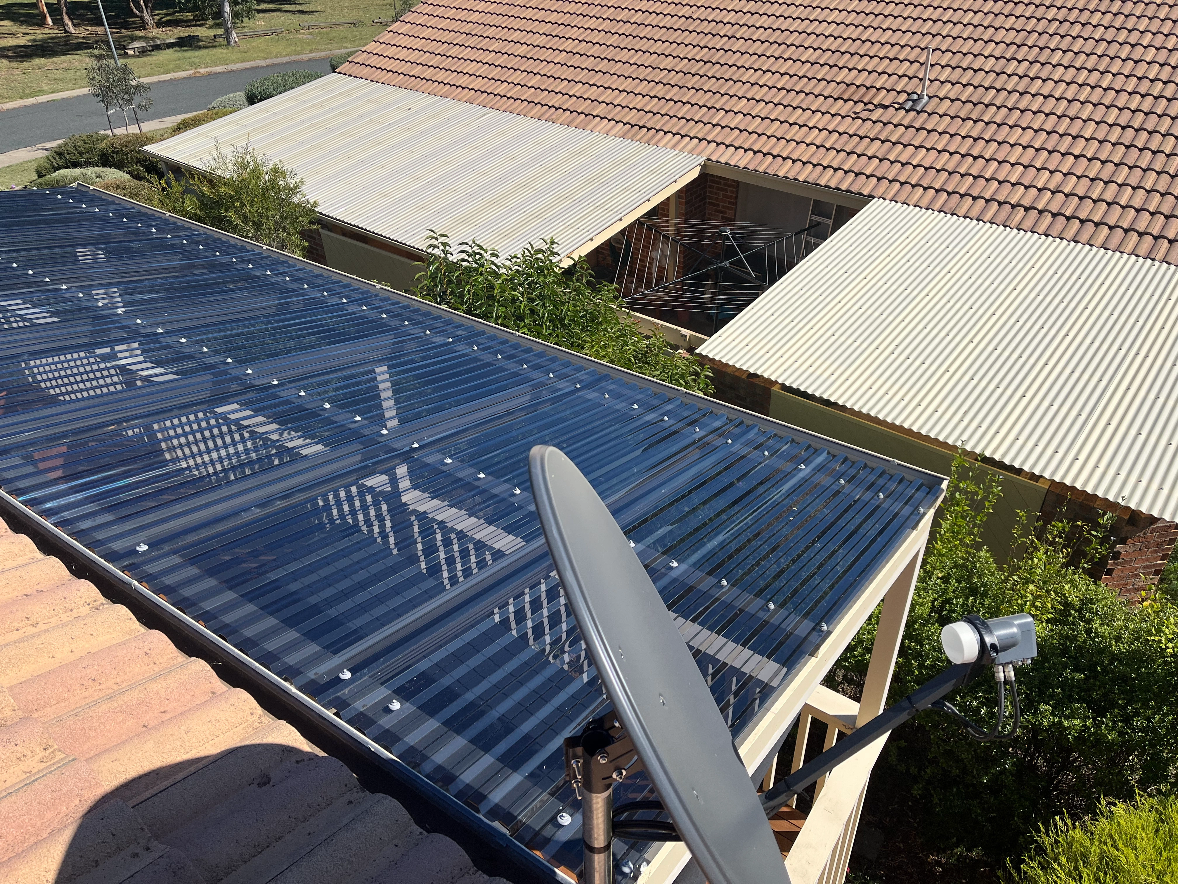 Polycarbonate Roofing project in Franklin, ACT by ShelterSafe - Hail cracked through this Franklin patio roof, leaving it unusable. We replaced all the damaged poly... Polycarbonate roof replacement Franklin, ACT - professional work