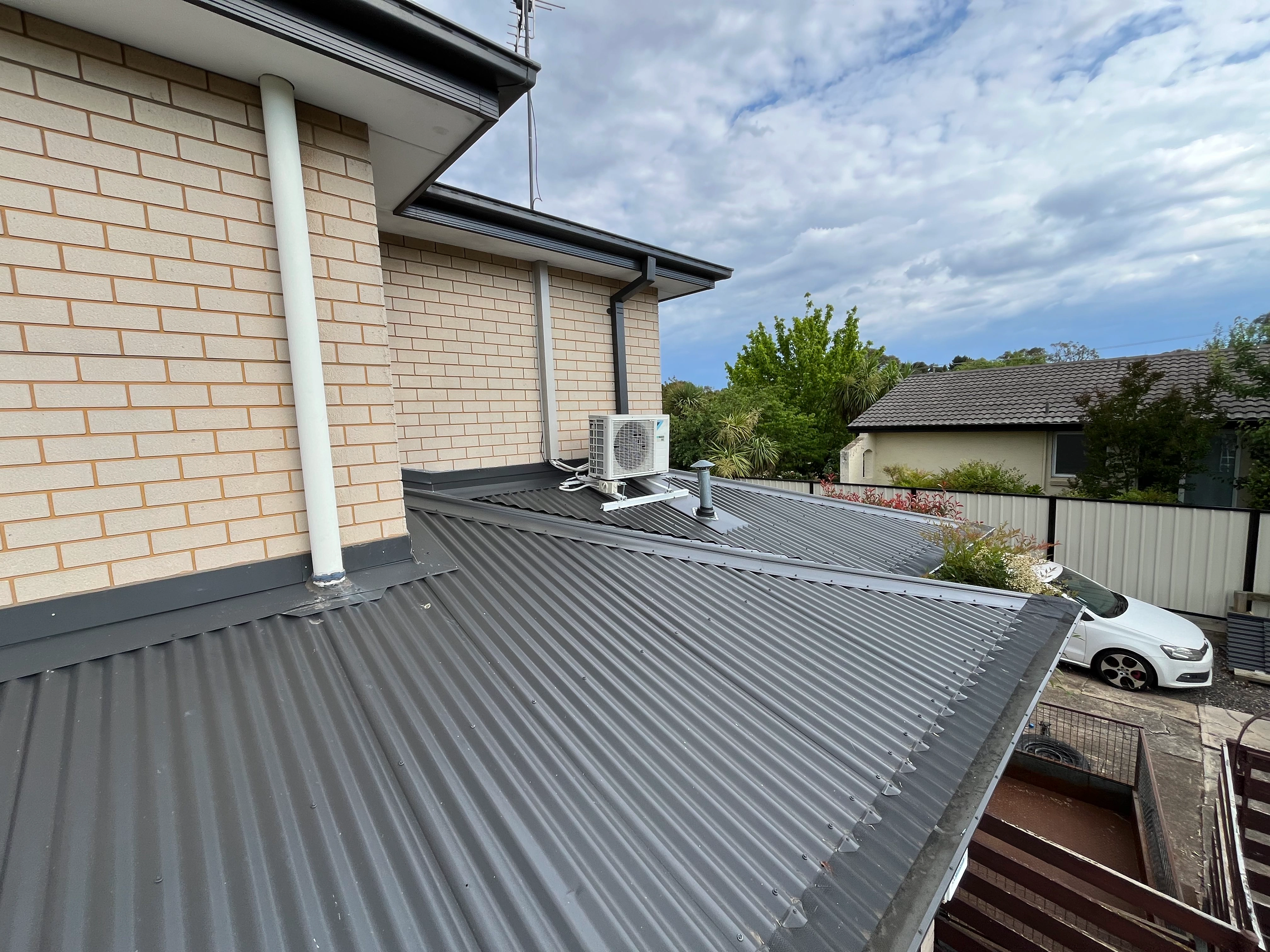 Metal Roofing project in Holt, ACT by ShelterSafe - Storm damage meant this Holt home needed a complete metal roof replacement. We stripped the old shee... Colorbond metal roof installation Holt, ACT - professional roofing work