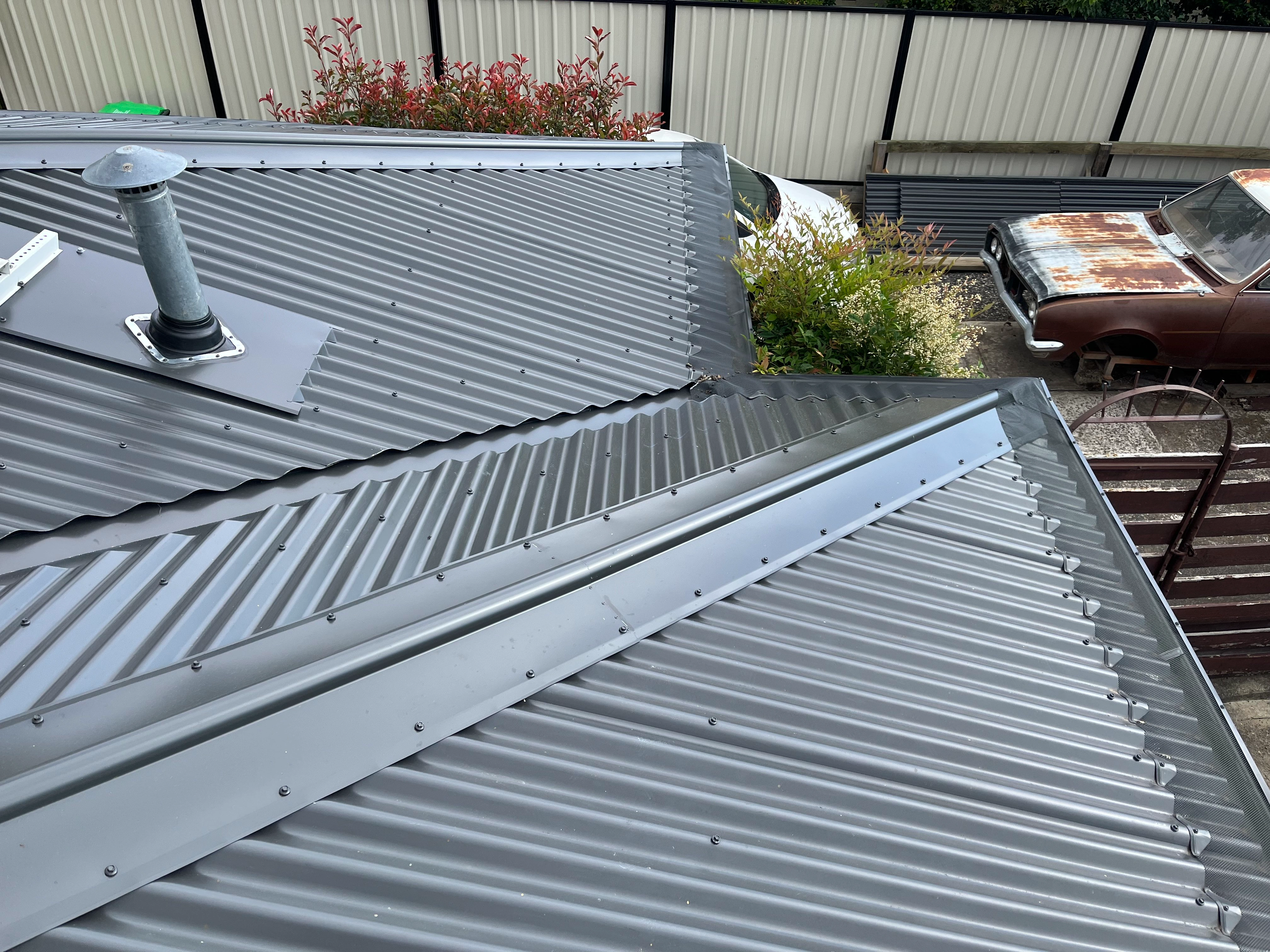 Metal Roofing project in Holt, ACT by ShelterSafe - Storm damage meant this Holt home needed a complete metal roof replacement. We stripped the old shee... Corrugated metal roof replacement Holt, ACT - ShelterSafe roofing