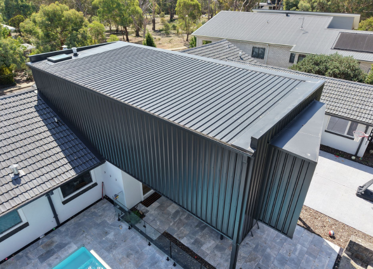 Metal Roofing project in Belconnen, ACT by ShelterSafe - This Belconnen extension needed Kliplok roofing and cladding to match the modern design. We installe... Colorbond metal roof installation Belconnen, ACT - professional roofing work