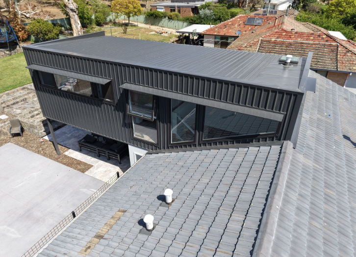 Metal Roofing project in Belconnen, ACT by ShelterSafe - This Belconnen extension needed Kliplok roofing and cladding to match the modern design. We installe... Corrugated metal roof replacement Belconnen, ACT - ShelterSafe roofing