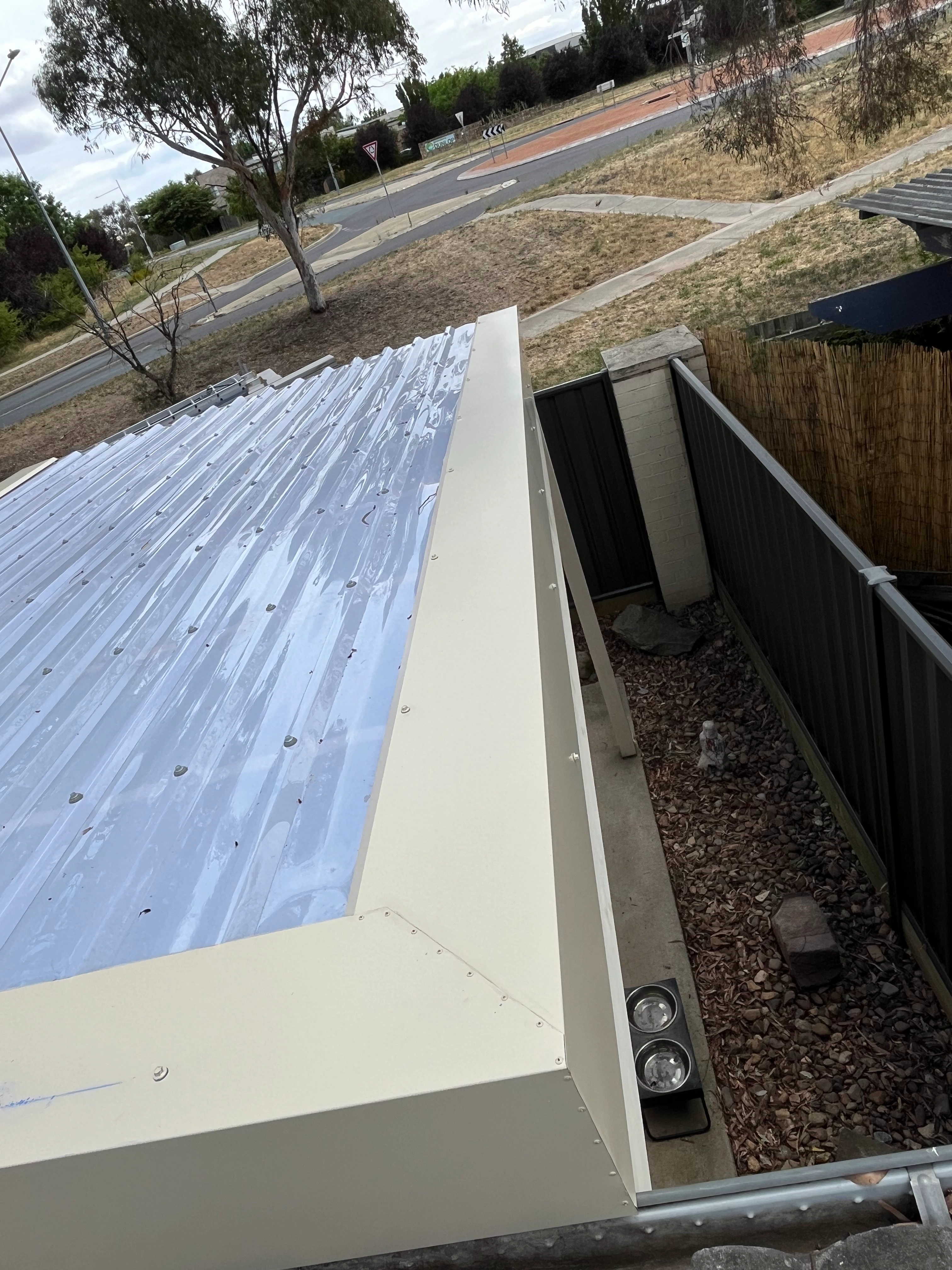Polycarbonate Roofing project in Queanbeyan, NSW by ShelterSafe - Queanbeyan gets hit hard by hailstorms, and this patio was no exception. We replaced all the smashed... Polycarbonate patio roof Queanbeyan, NSW - transparent roofing installation