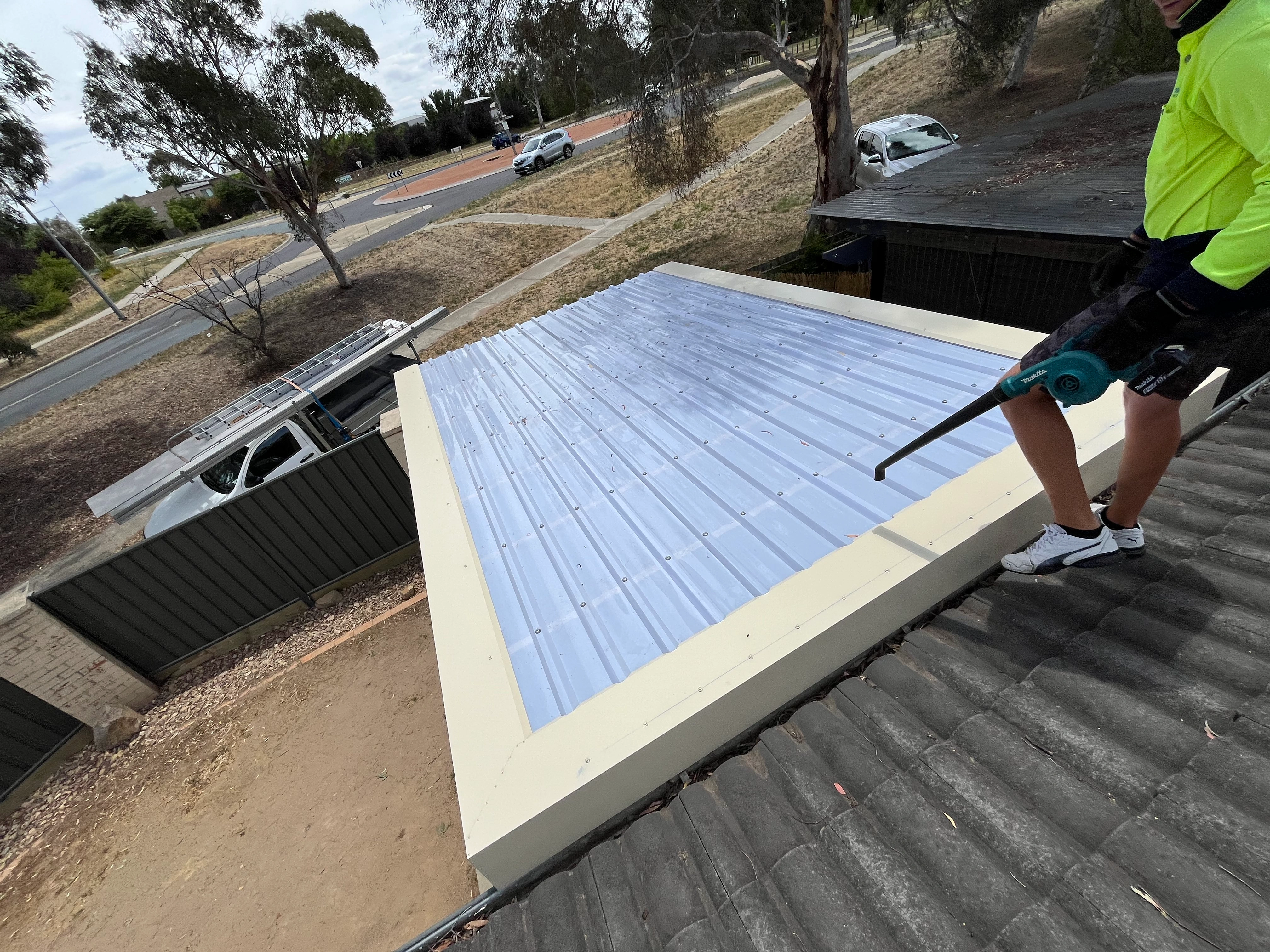 Polycarbonate Roofing project in Queanbeyan, NSW by ShelterSafe - Queanbeyan gets hit hard by hailstorms, and this patio was no exception. We replaced all the smashed... Clear patio roof Queanbeyan, NSW - polycarbonate installation