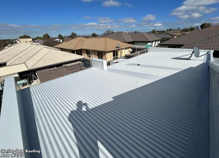 Metal Roofing project in Franklin, ACT by ShelterSafe - This Franklin home needed full metal roof replacement with custom flashings. We finished in one week... Corrugated metal roof replacement Franklin, ACT - ShelterSafe roofing