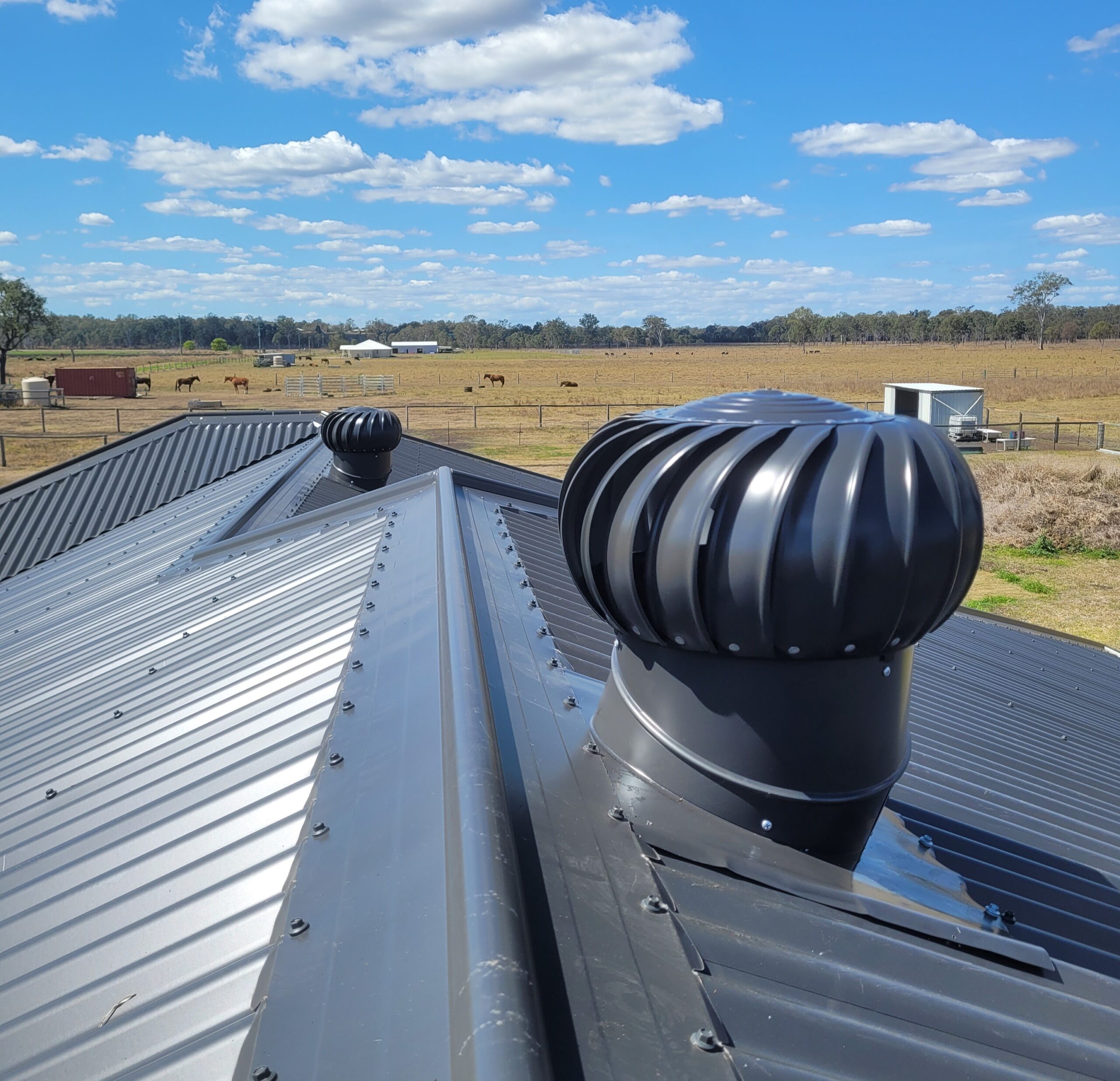 Dual black whirlybird ventilation system installation in Canberra by ShelterSafe Black whirlybird installation Canberra - dual roof ventilation system